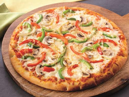 Pizza with capicollo, pesto and vegetables