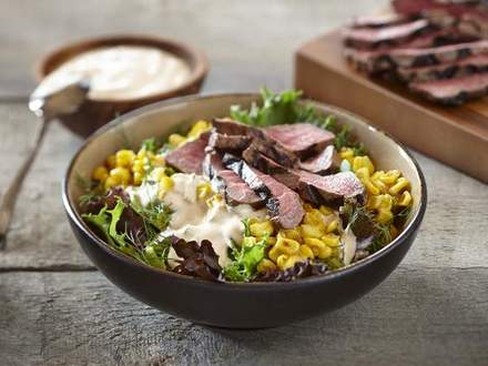 Mixed greens, corn and beef bowl