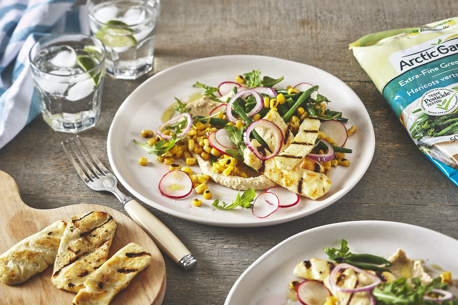 Hummus and roasted vegetables topped with grilled cheese | Arctic Gardens